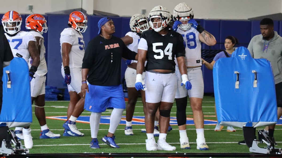 Florida Gators OL Micah Mazzccua and OL coach Darnell Stapleton